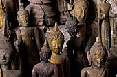 Luang Prabang, Laos - The Pak Ou Caves, the lower cave called Tham Ting. The caves, a Buddhist pilgrimage site, are a repository of old Buddha statues. 